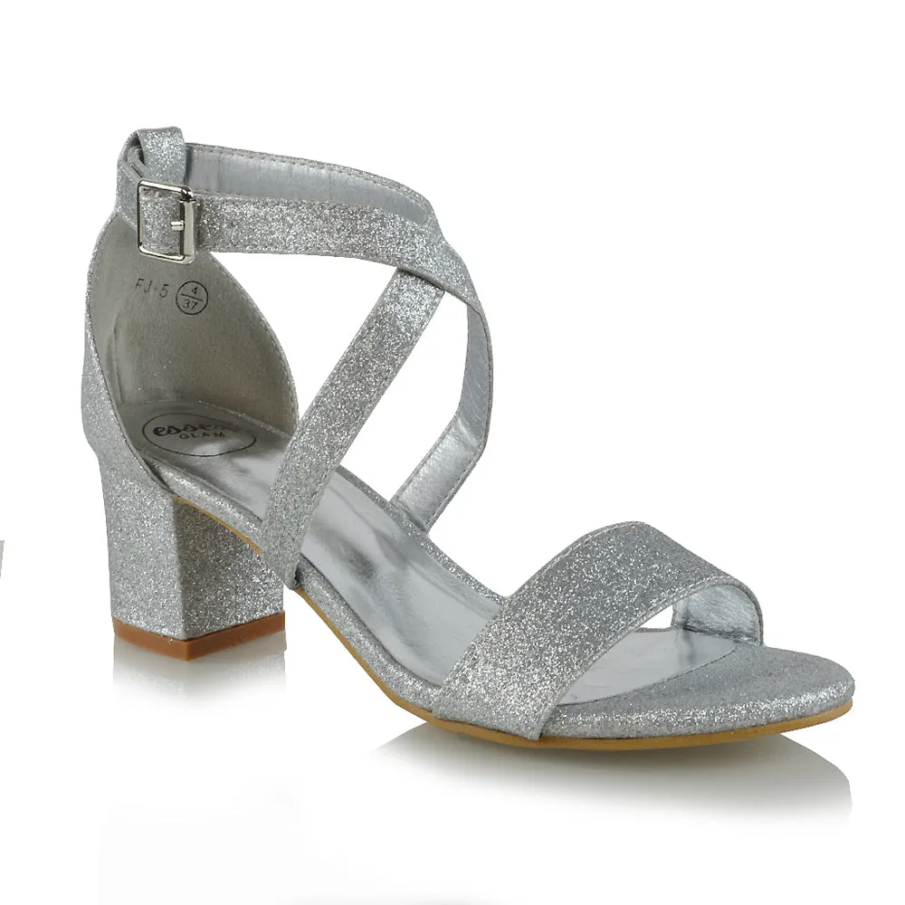 JORDYN CROSS OVER BUCKLE STRAP CHUNKY LOW BLOCK HEELS IN SILVER GLITTER