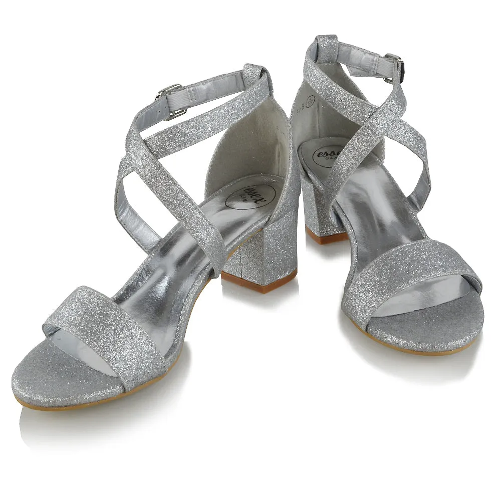 JORDYN CROSS OVER BUCKLE STRAP CHUNKY LOW BLOCK HEELS IN SILVER GLITTER