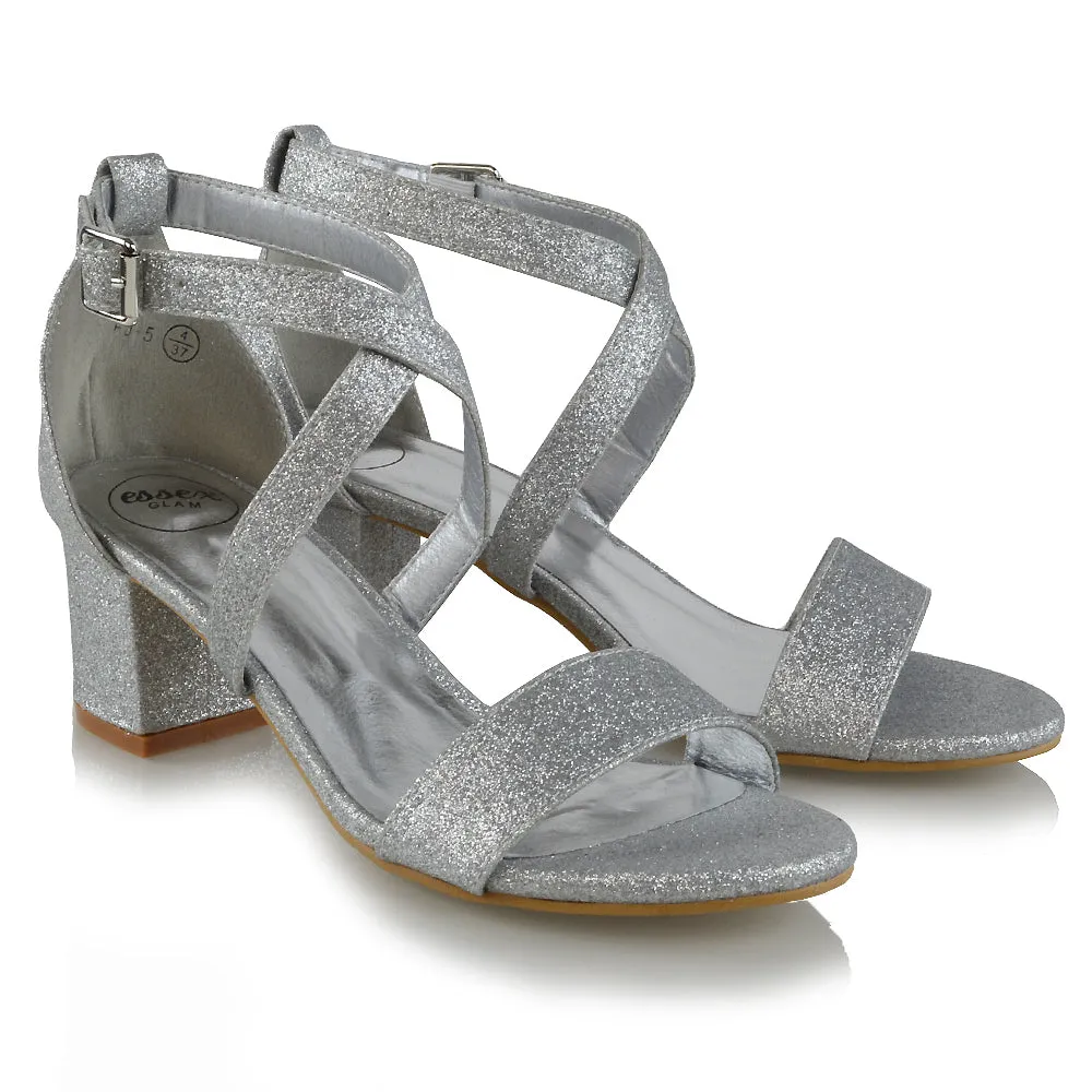 JORDYN CROSS OVER BUCKLE STRAP CHUNKY LOW BLOCK HEELS IN SILVER GLITTER